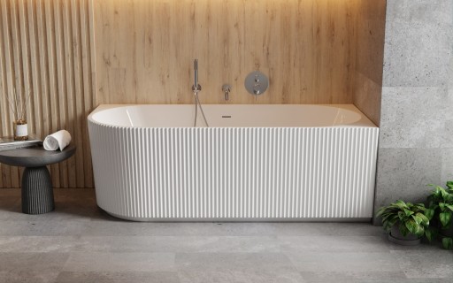 Cada freestanding Besco Denaya 150x75cm  montare pe colt  orientare dreapta  exterior canelat  sifon click-clack cu ornamente albe  alb lucios